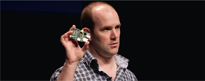Eben Upton holds a Raspberry Pi in his hand